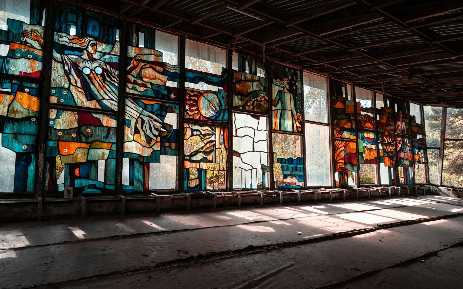 blue and brown wooden framed glass window